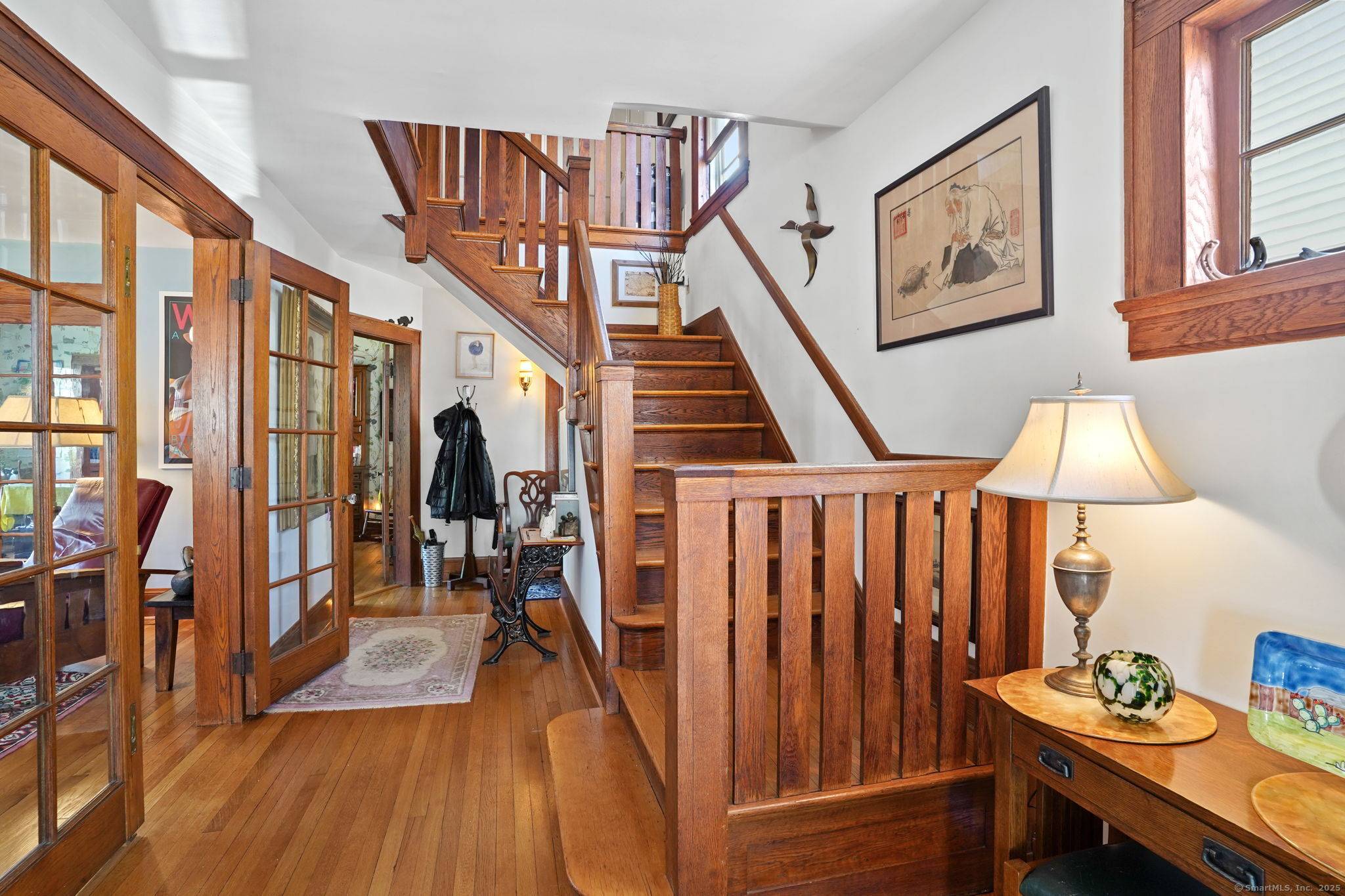 Discover the charm of this exceptional Brooklawn Colonial, a true gem built in 1907 that embodies the essence of Arts and Crafts architecture.