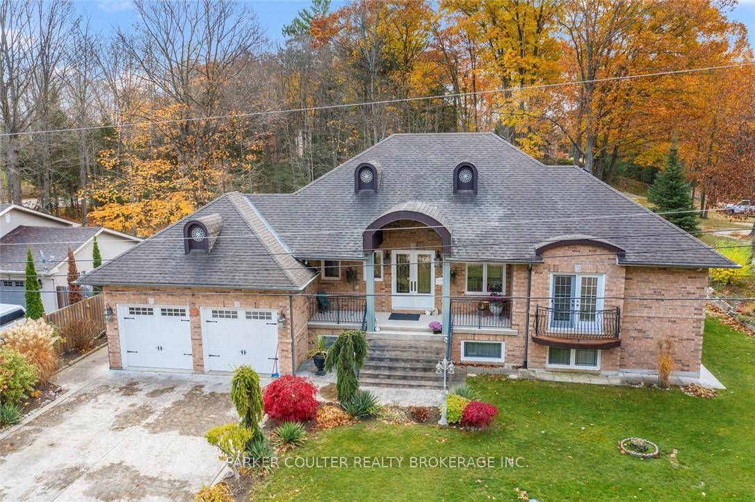 EXTREME CUSTOM BUILT ESTATE HOME ON A GORGEOUS LOT BACKING ONTO WOODS GREENSPACE.