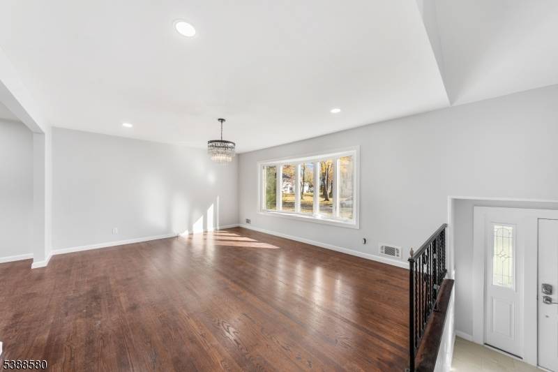 Welcome home to this beautifully Renovated home, move in ready split level residence, perfectly situated on a spacious lot along a quiet, tree lined street with no neighbors directly across ...