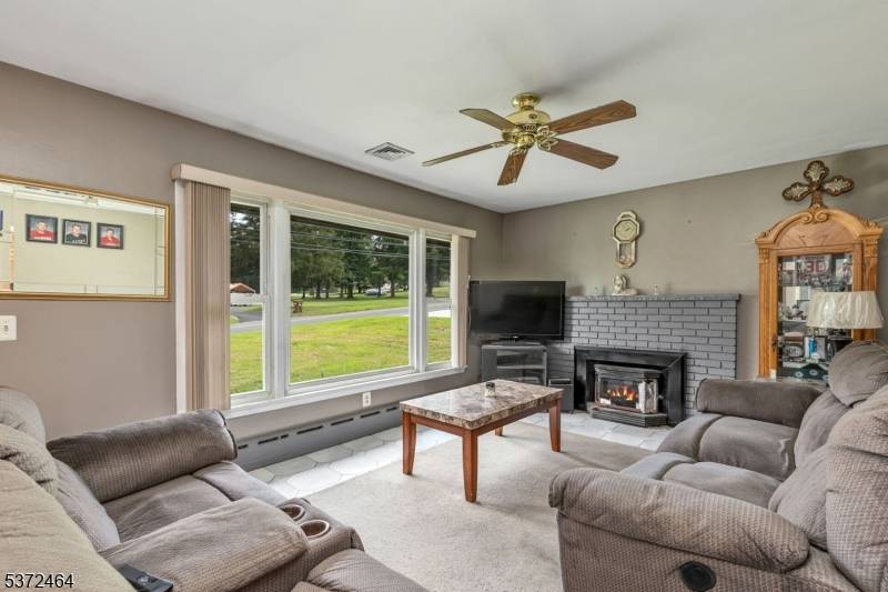 NOT in a flood zone ! Spacious expanded ranch on 0.