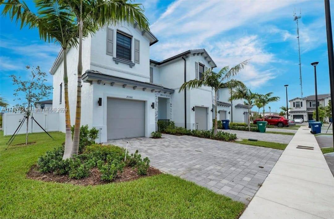 Welcome Home to this Stunning New Construction Townhouse situated in the vibrant city of Miami Gardens !
