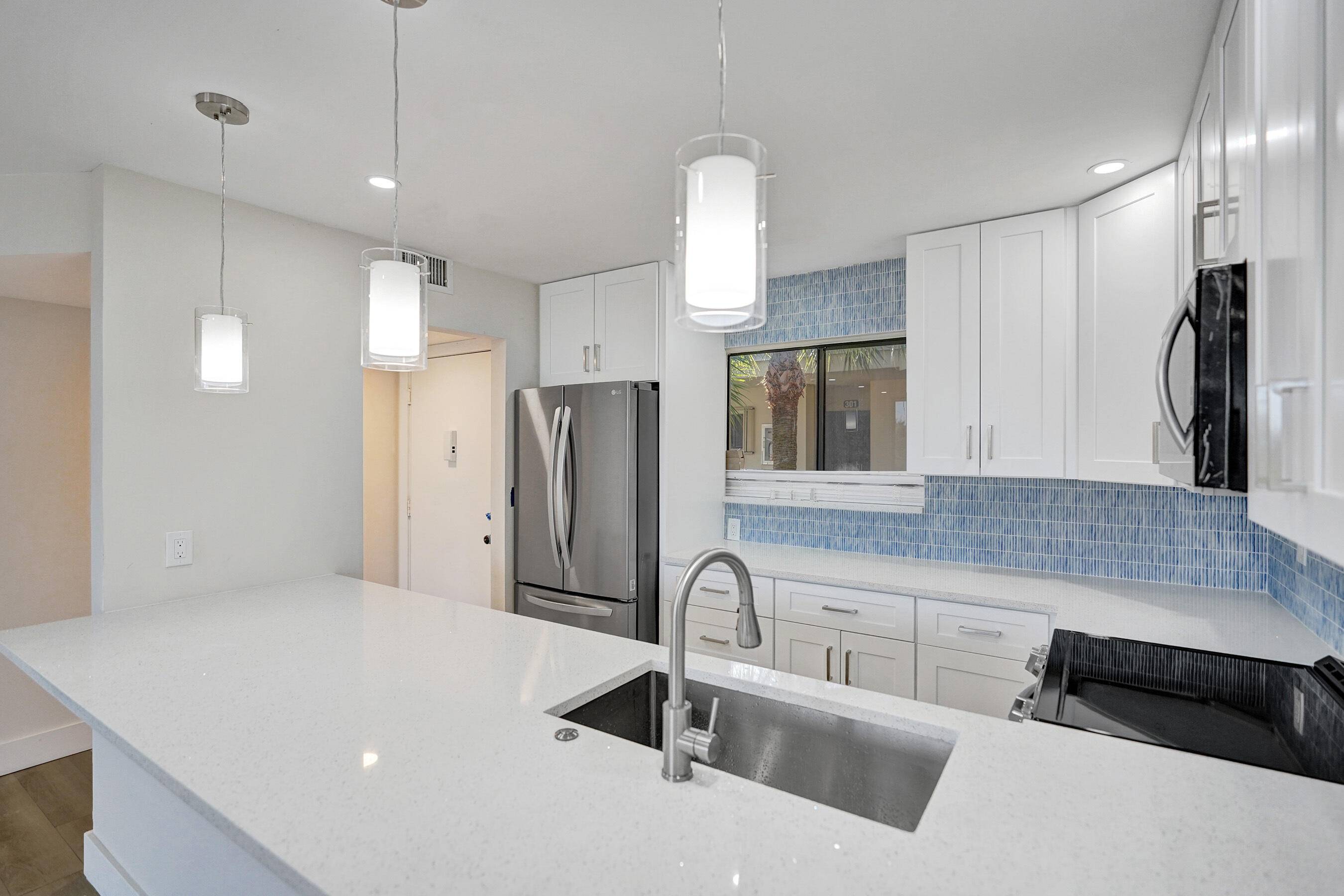 Total renovation. Exquisite top floor condo where modern sophistication meets attention to detail.