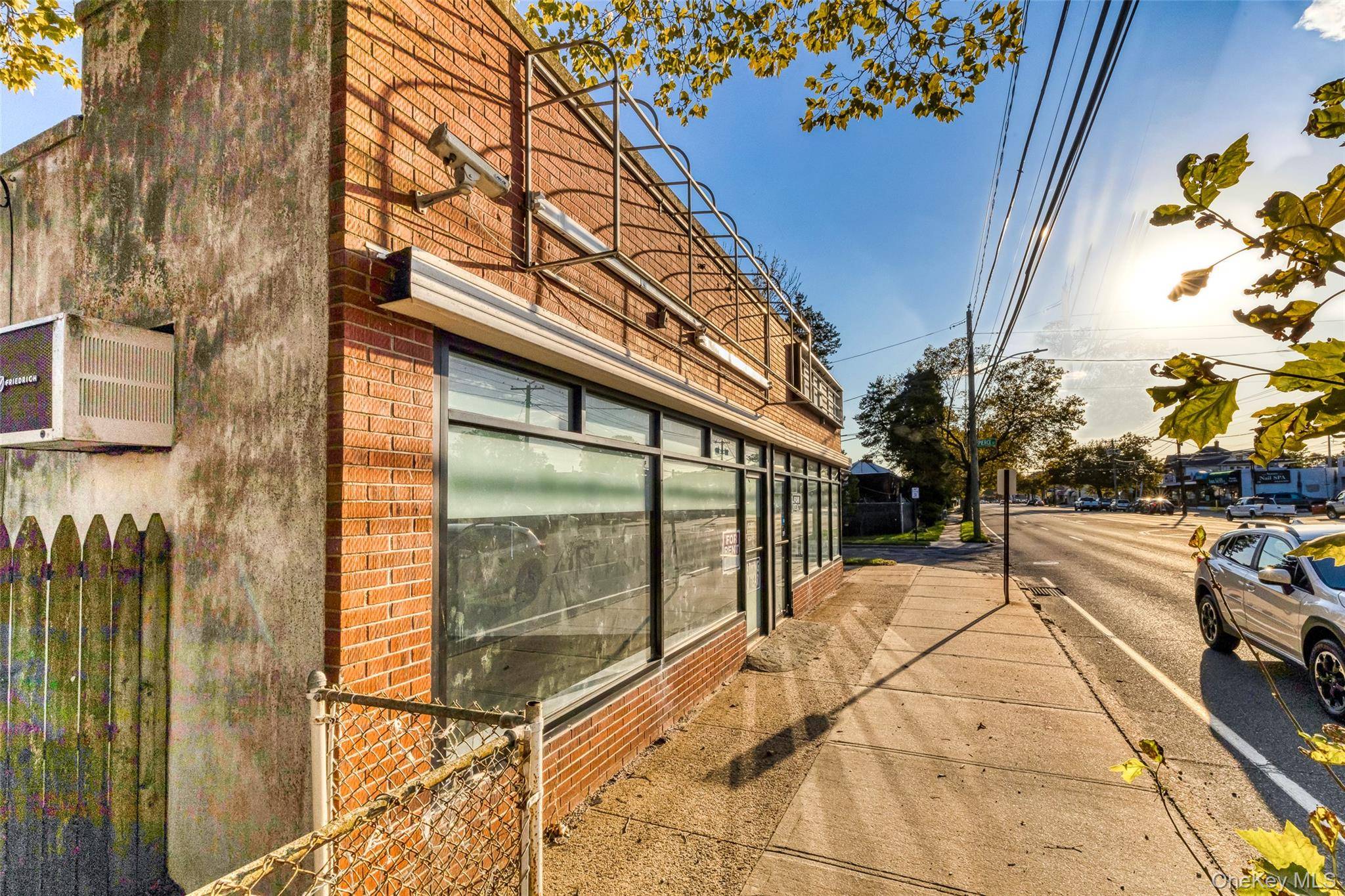 Two Stores. Well maintained Commercial retail building containing 2 stores approx 2488 sq ft plus 2400 sq ft full basement with parking on the back.