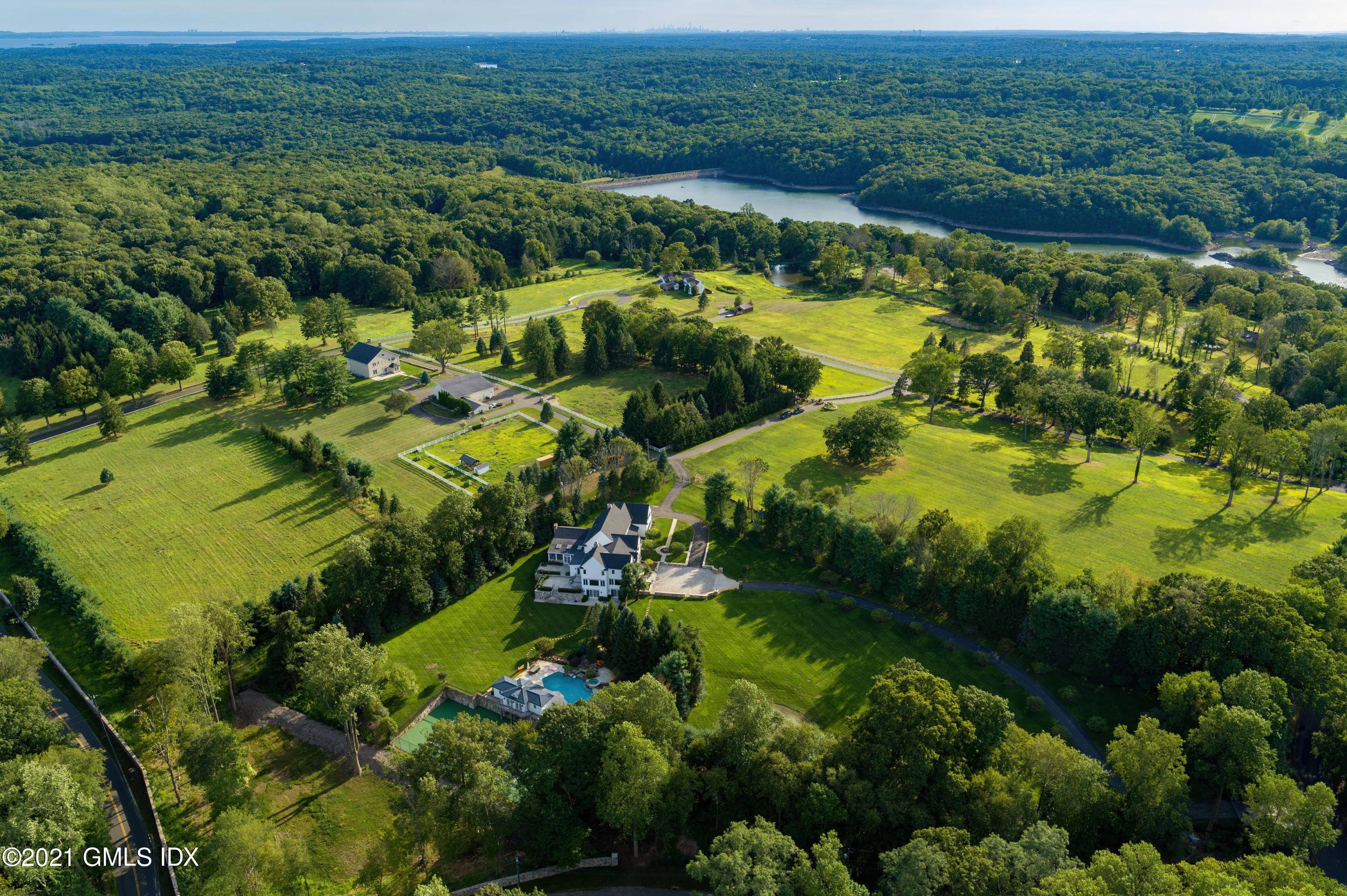 107 rolling and park like acres and fenced in paddocks on the N Stamford Greenwich border.
