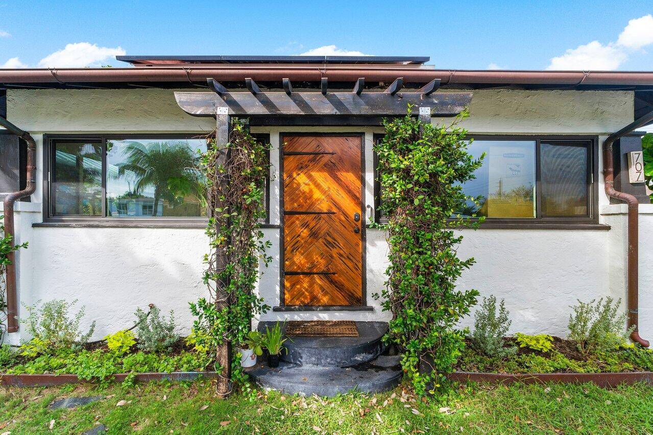 Price Adjustment ! Explore this unique multi family gem in West Palm Beach featuring 3 units total ; the main house up front and a detached structure in the back ...