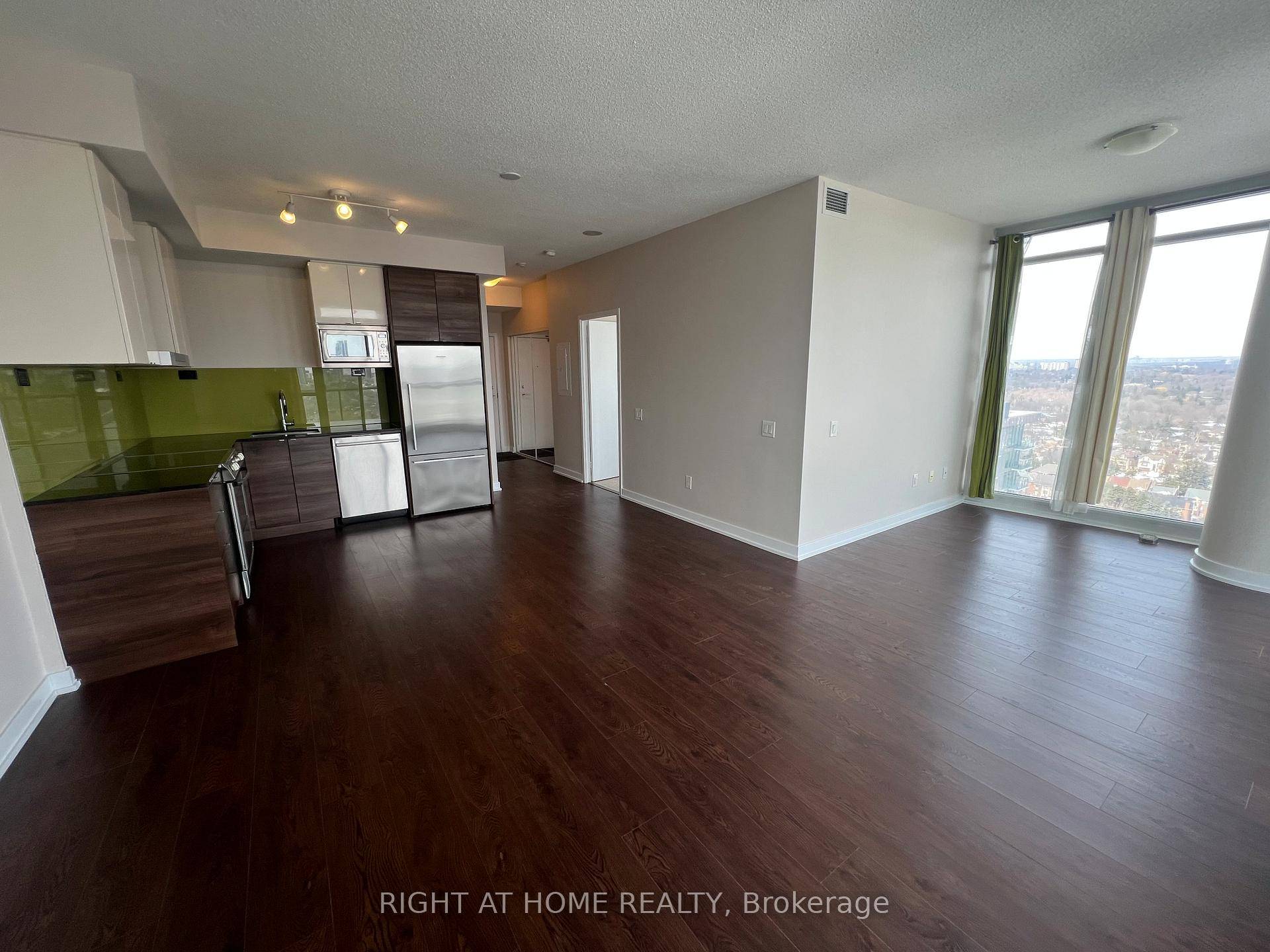 Freshly painted ! Rare 1 1 Corner Unit.