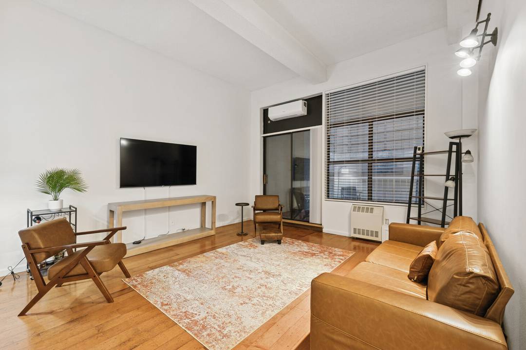 Welcome home to this oversized loft style one bedroom, one bath residence featuring your very own private terrace.