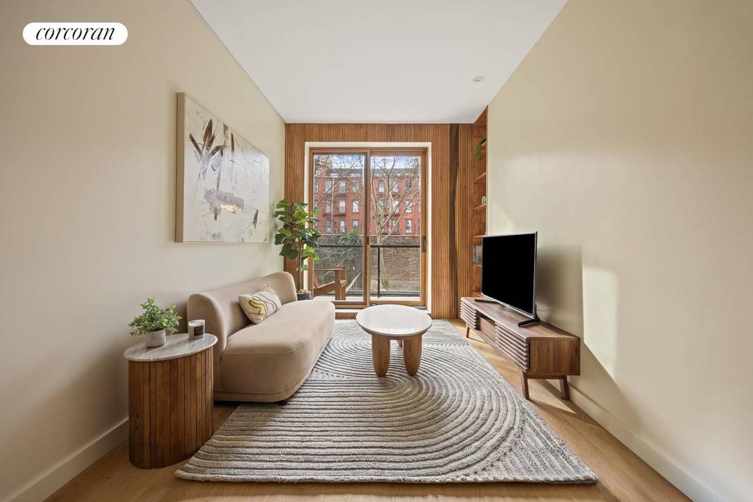 Welcome to Residence 2R at 598 Sterling Place a thoughtfully designed one bedroom, one bath home spanning 562 square feet, where warm materials, clean lines, and seamless indoor outdoor living ...