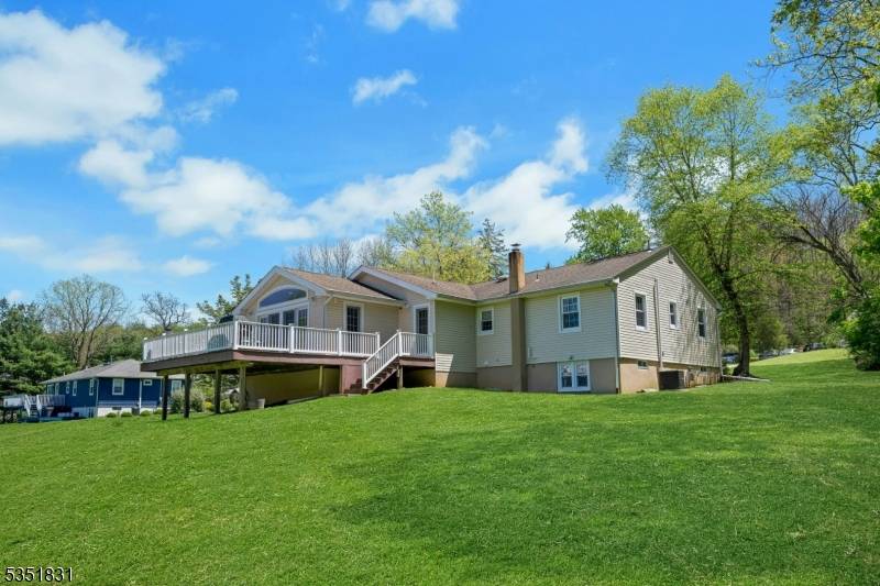 Lovely, expanded ranch style home with 3 bedrooms and 2.