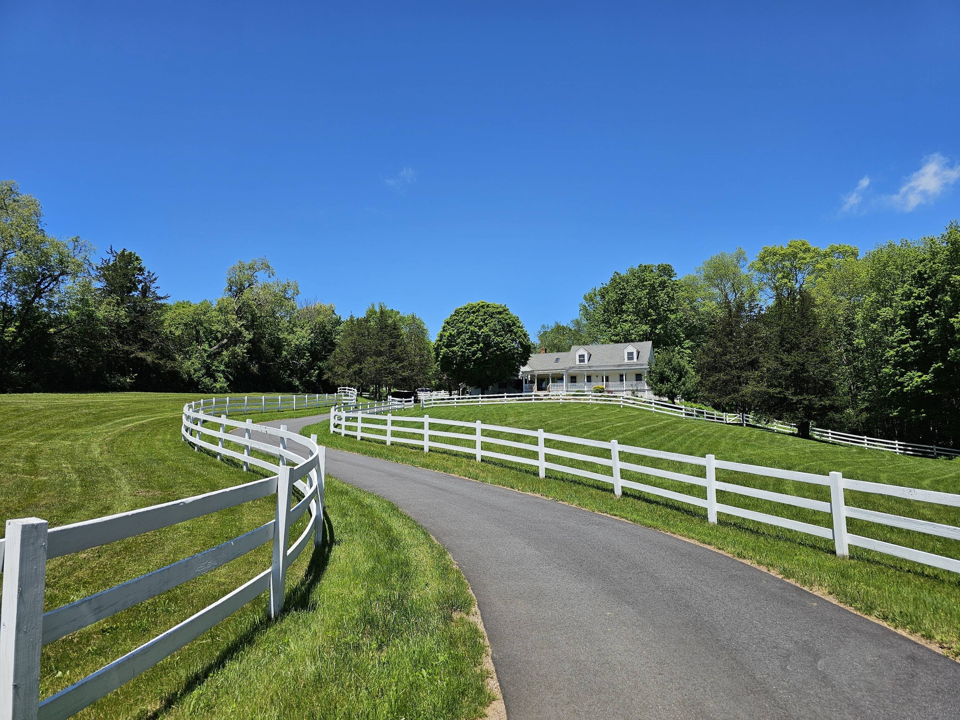 Open Meadow Farm, a beautifully maintained property offering a blend of rural charm and modern conveniences.
