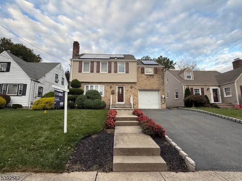 Charming 4 bedroom, 1. 5 bath Colonial on quiet street in a lovely neighborhood.