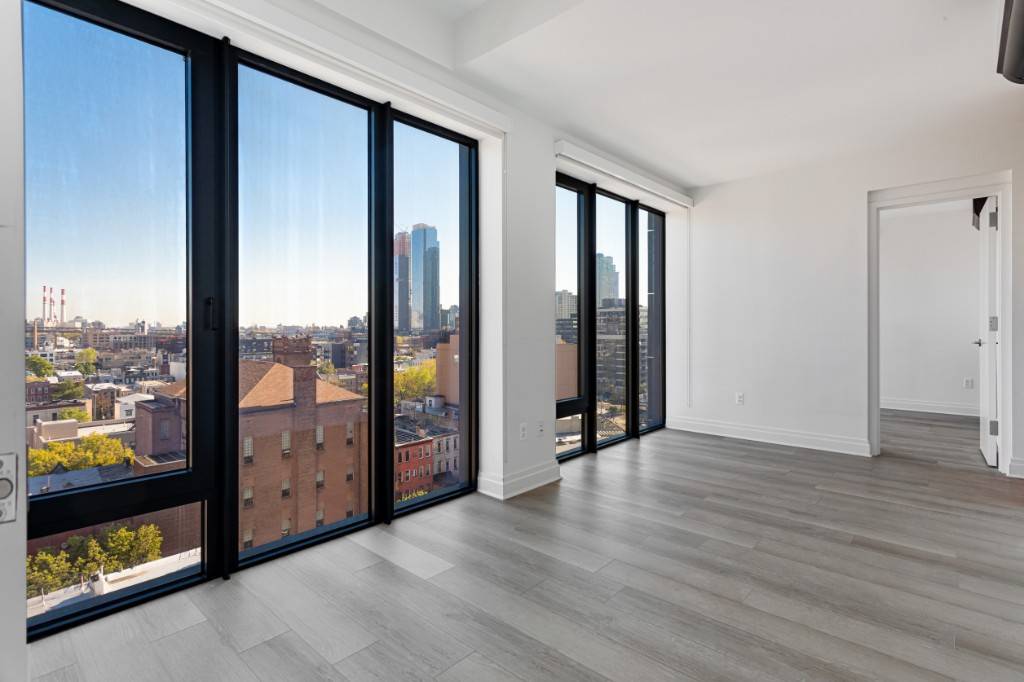 High floor two bedroom apartment with large private terrace, floor to ceiling windows, unparalleled views of LIC, East River and Queensboro Bridge, and in unit washer dryer.