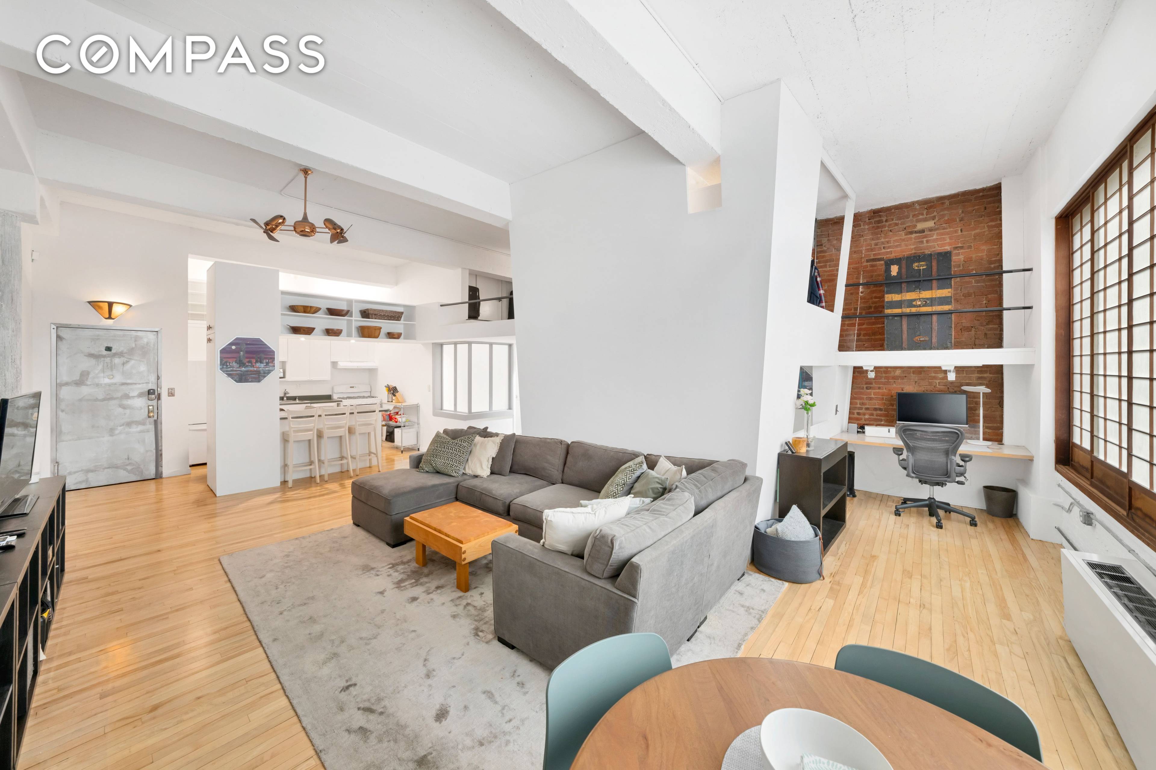 Spacious Loft with 12 Foot Ceilings amp ; Massive Windows Experience urban living at its finest in this stunning loft apartment featuring soaring 12 foot ceilings and massive windows that ...