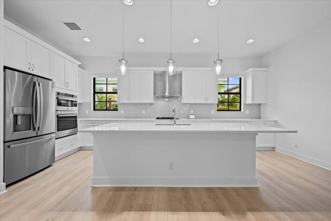 Welcome to 5324 Sagan Lane, a stunning three story Spanish style townhome located in the highly sought after Alton community.