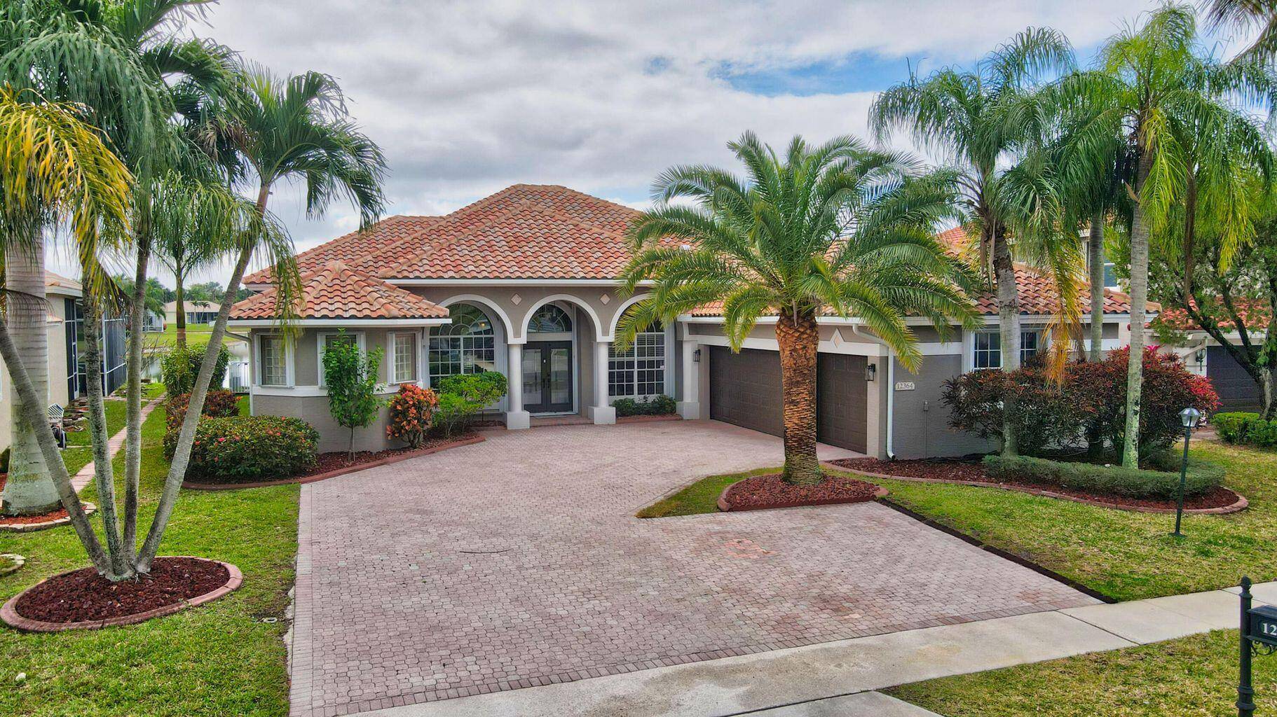 FANTASTIC ONE STORY LAKEFRONT HOME WITH BEAUTIFUL VIEWS FROM JUST ABOUT EVERY MAJOR ROOM.
