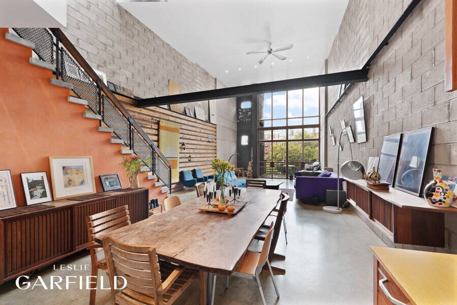 56 East 1st Street is a spectacular, 22 wide, 3 unit, industrial chic downtown property.