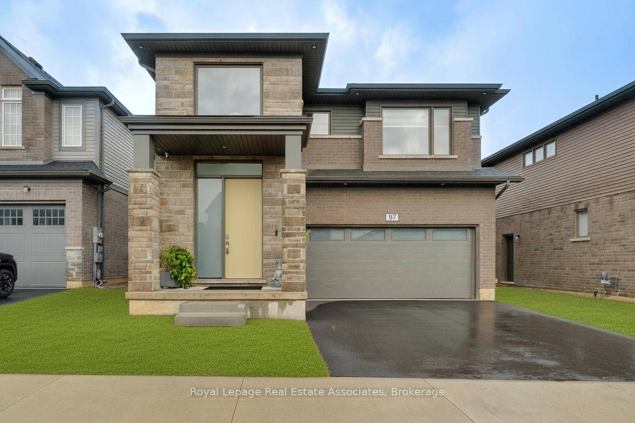 Built in 2024 by Mountainview Homes, this impressive 4 bedroom, 4 bathroom brick and stone residence showcases more than 3, 000 sq.