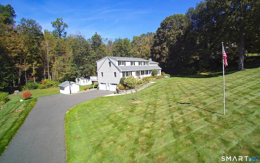 Exceptional 5BR colonial in sought after Westmoreland recreational neighborhood on park like acre with front porch, flowering trees, sprawling level lawn, expansive deck, stone patio, hot tub, multiple garden sheds, ...