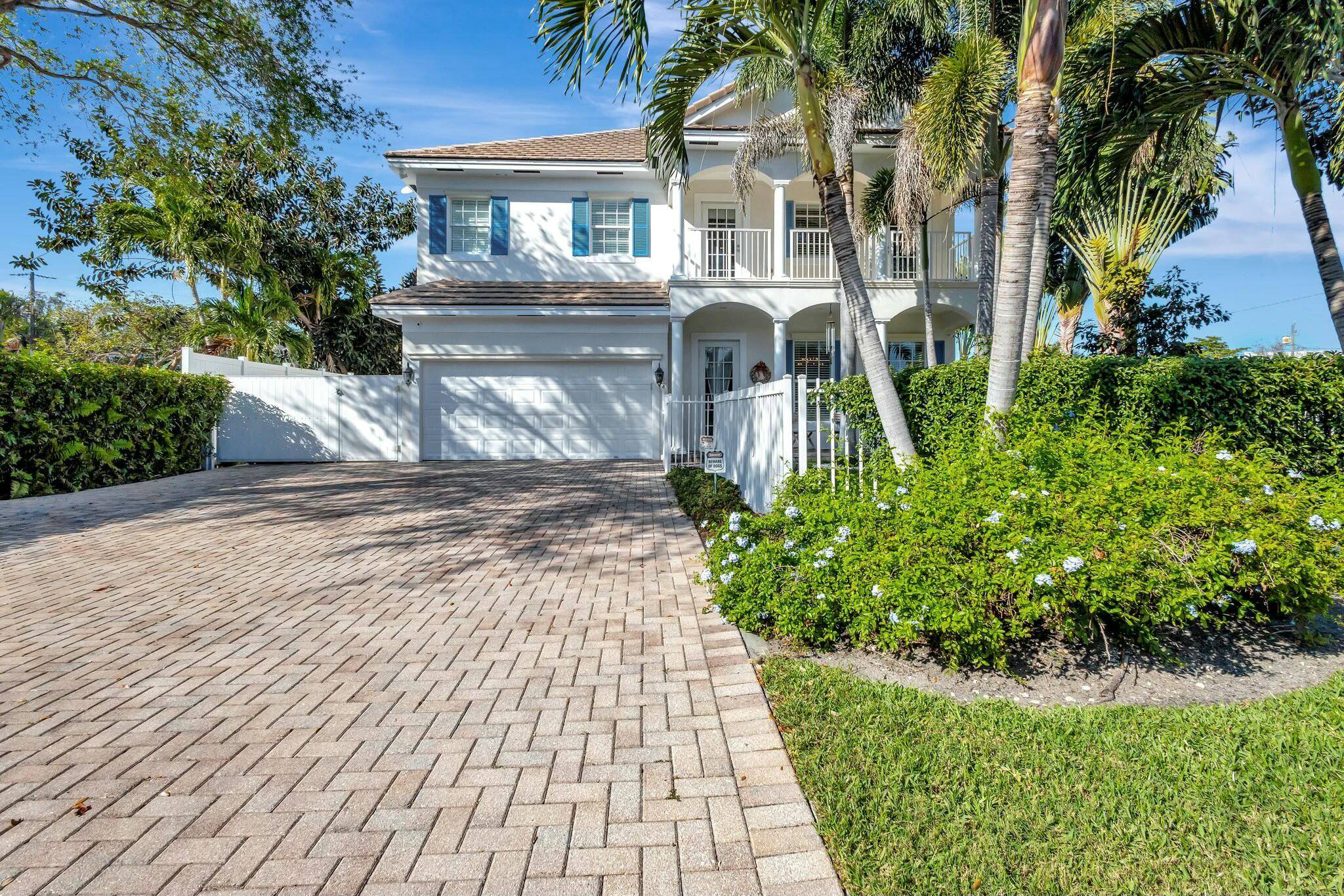 Charming 4 bed 3. 5 bath Key West style home in Lake Ida is completely updated and move in ready.