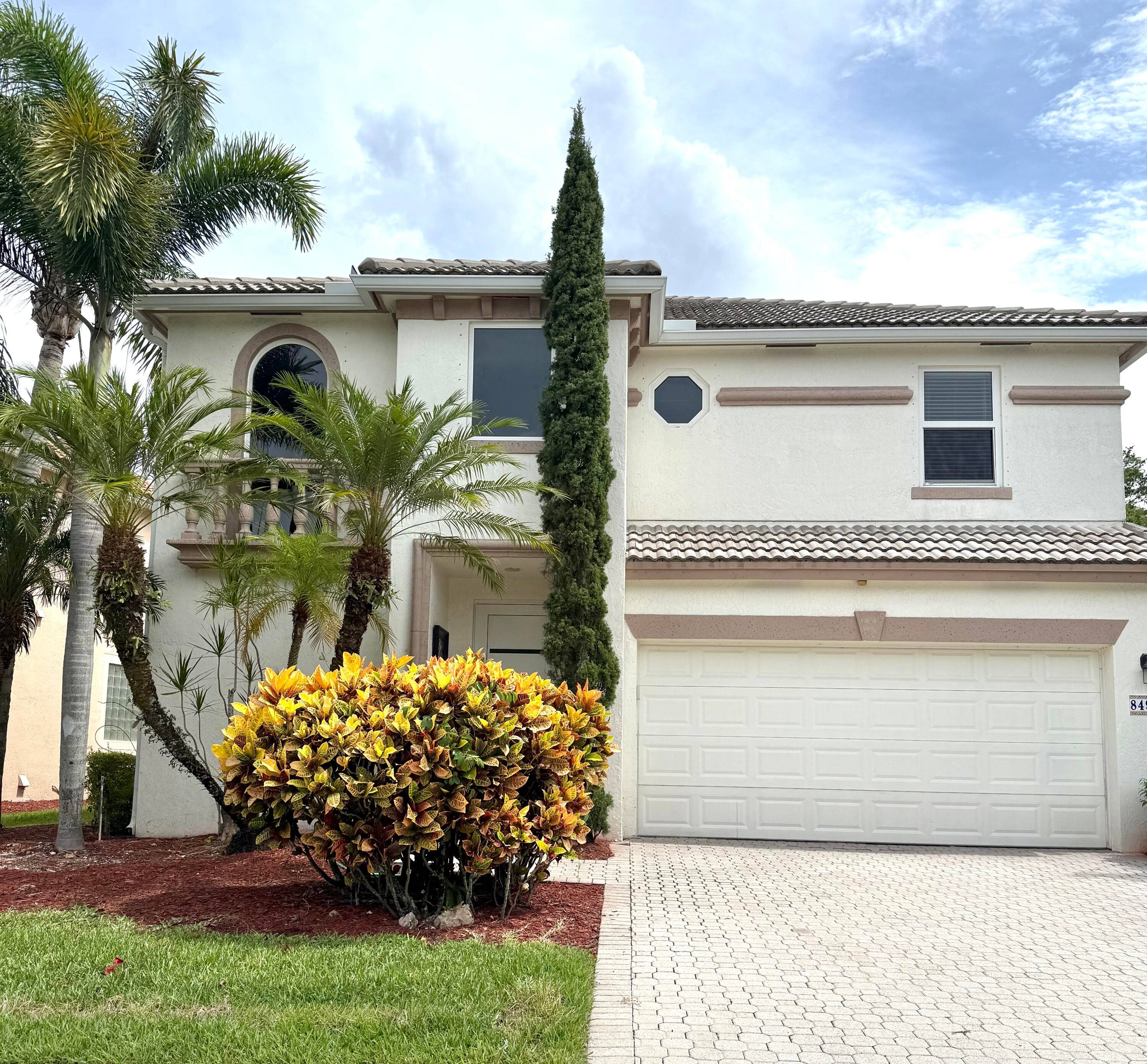 UPGRADED 4 BEDROOM, 3. 5 BATHROOM, 2 CAR GARAGE HOME IN EXCELLENT LOCATION !