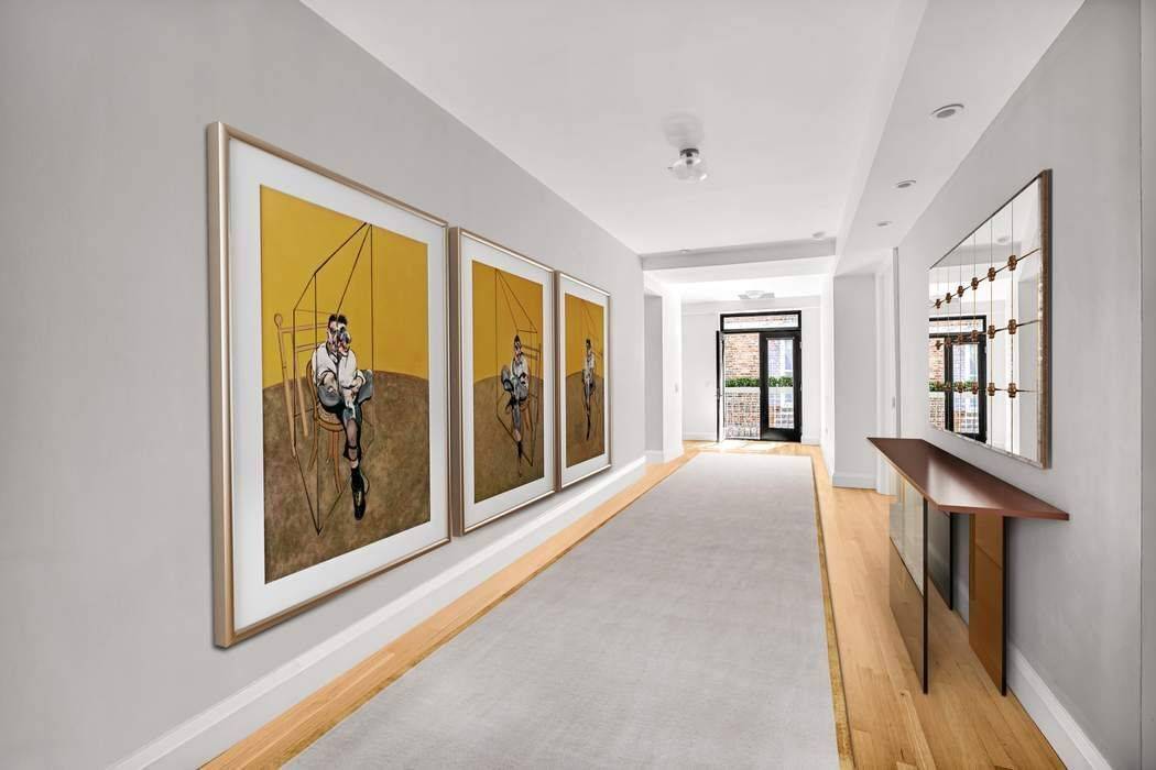 This is a beautiful home of approximately 2, 100 square feet in a full service condominium in the heart of the North TriBeCa Historic District.