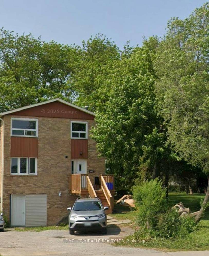 Beautiful end unit Freehold Townhouse at prime St.