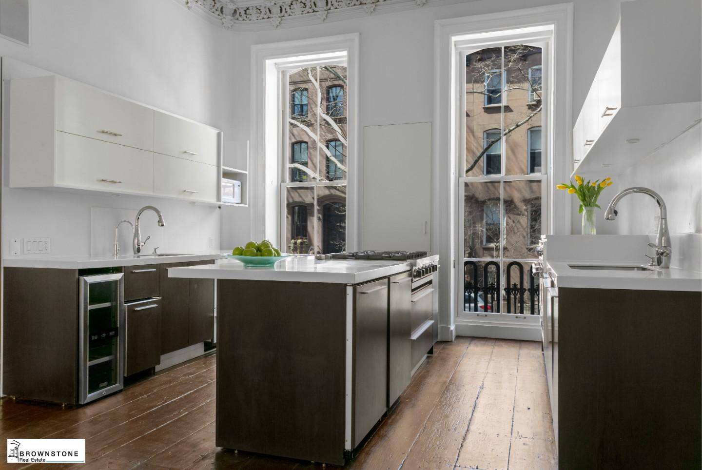 On a tree lined street in Historic Cobble Hill, 471 Henry Street is a beautiful brownstone townhouse renovated and redesigned to blend the feeling of an historic home with amenities ...