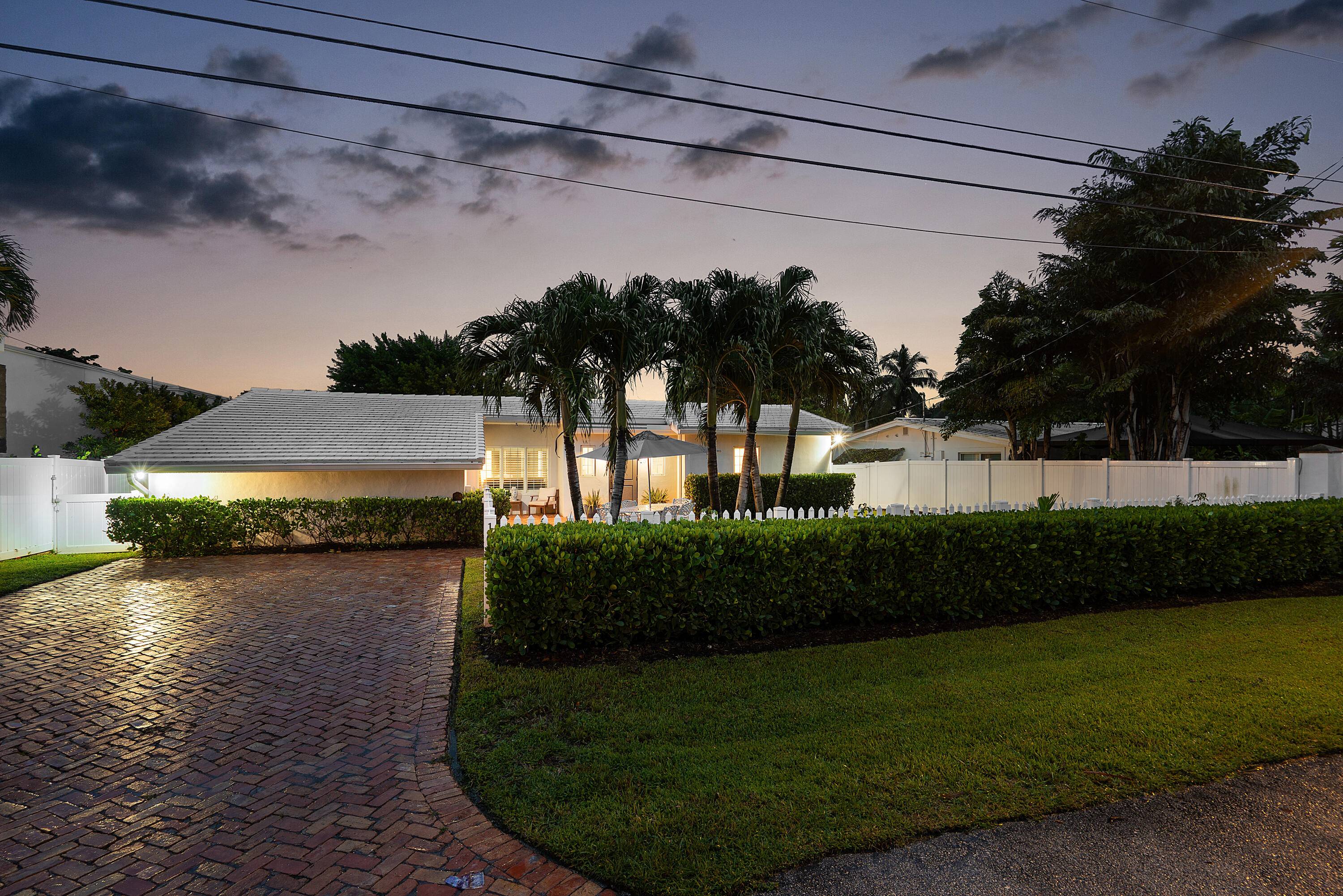 Experience Lakefront living at its finest in this beautifully upgraded home at 1630 NE 18th Avenue.