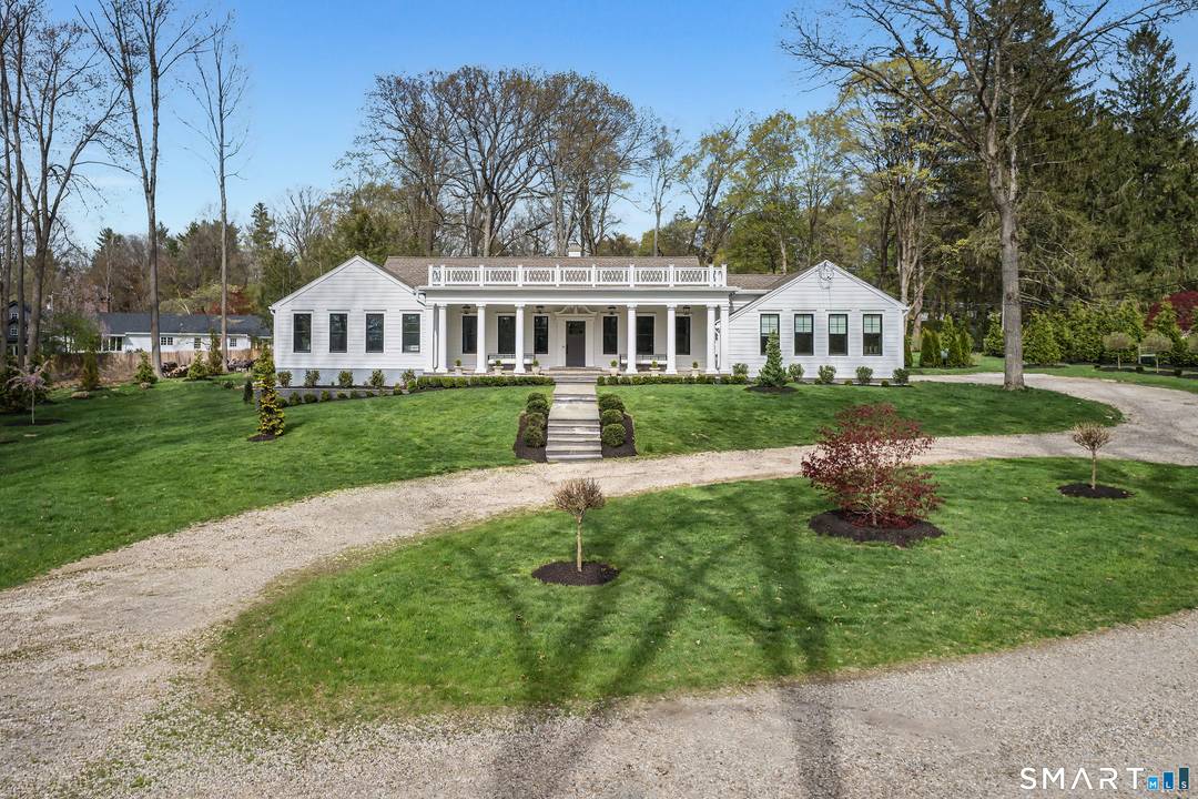 A bespoke, Georgian inspired luxury home, impeccably sited on coveted Golf Lane in South Ridgefield.