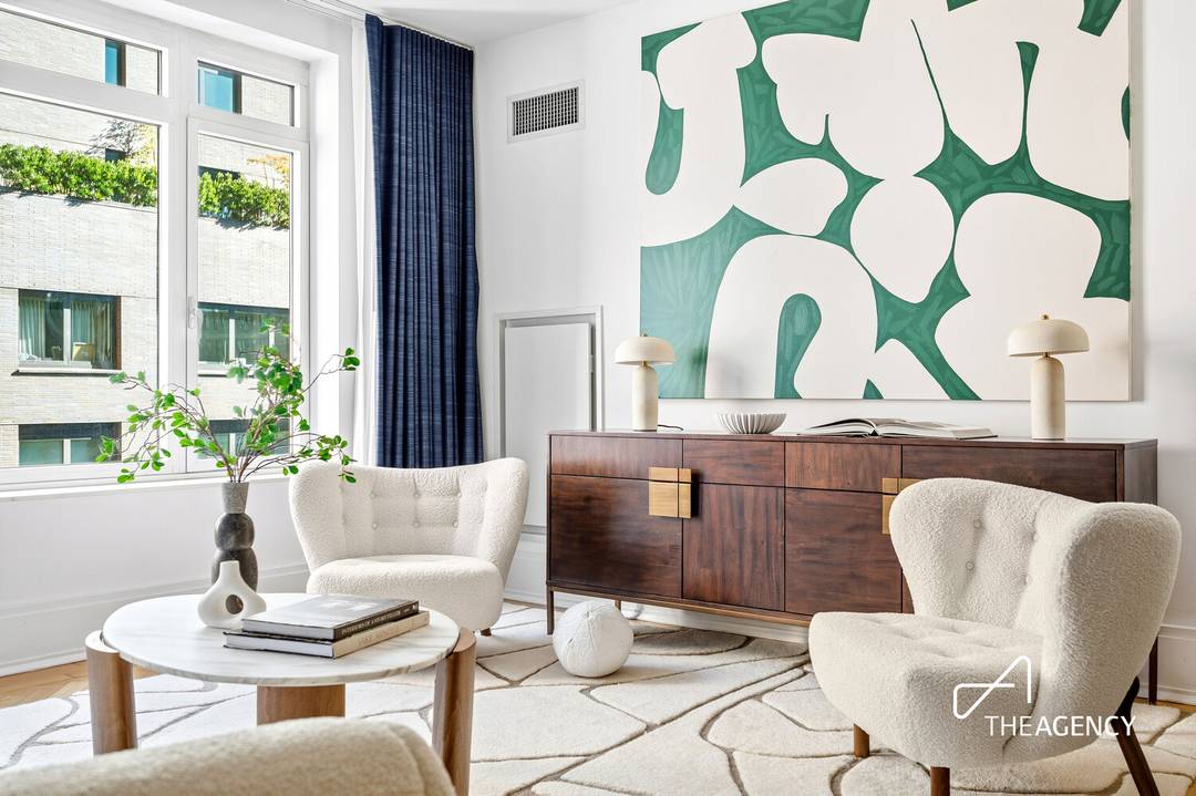 Presenting a refined two bedroom, two bathroom residence in the sought after Harrison Condominium, designed by Robert A.