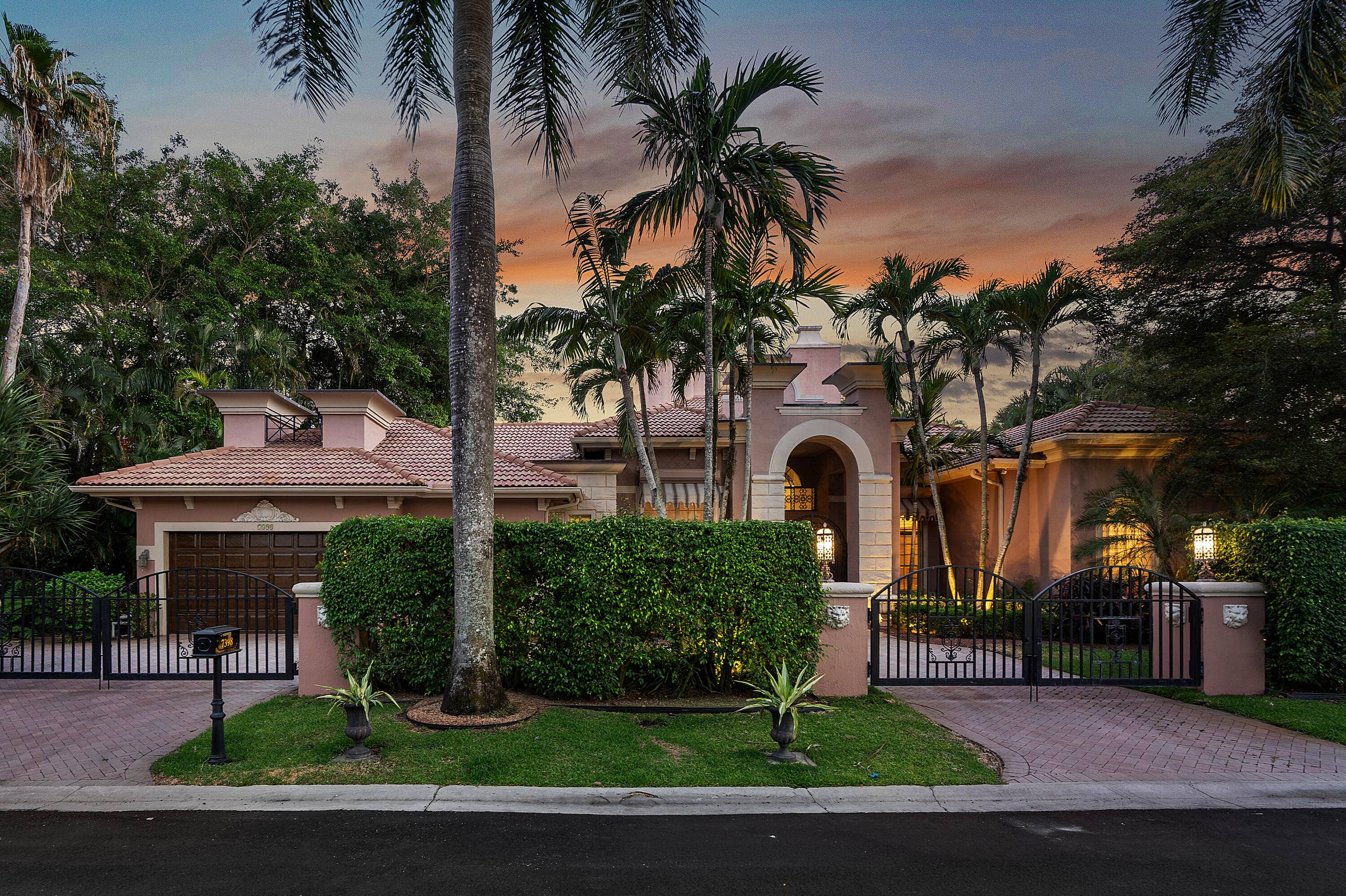 Rarely available Chateau estate in the coveted Country Club community of Boca Grove !