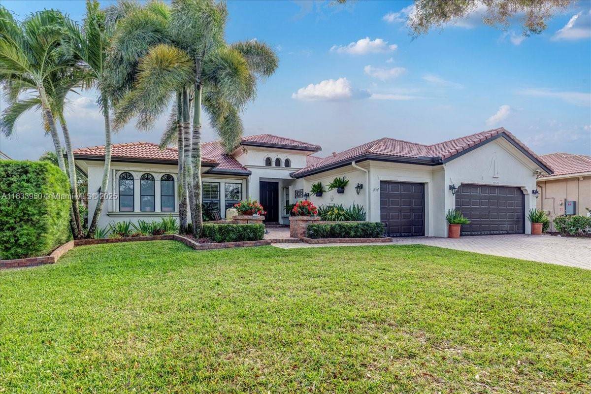 WATERFRONT PROPERTY Best price in prestigious Heron Bay !