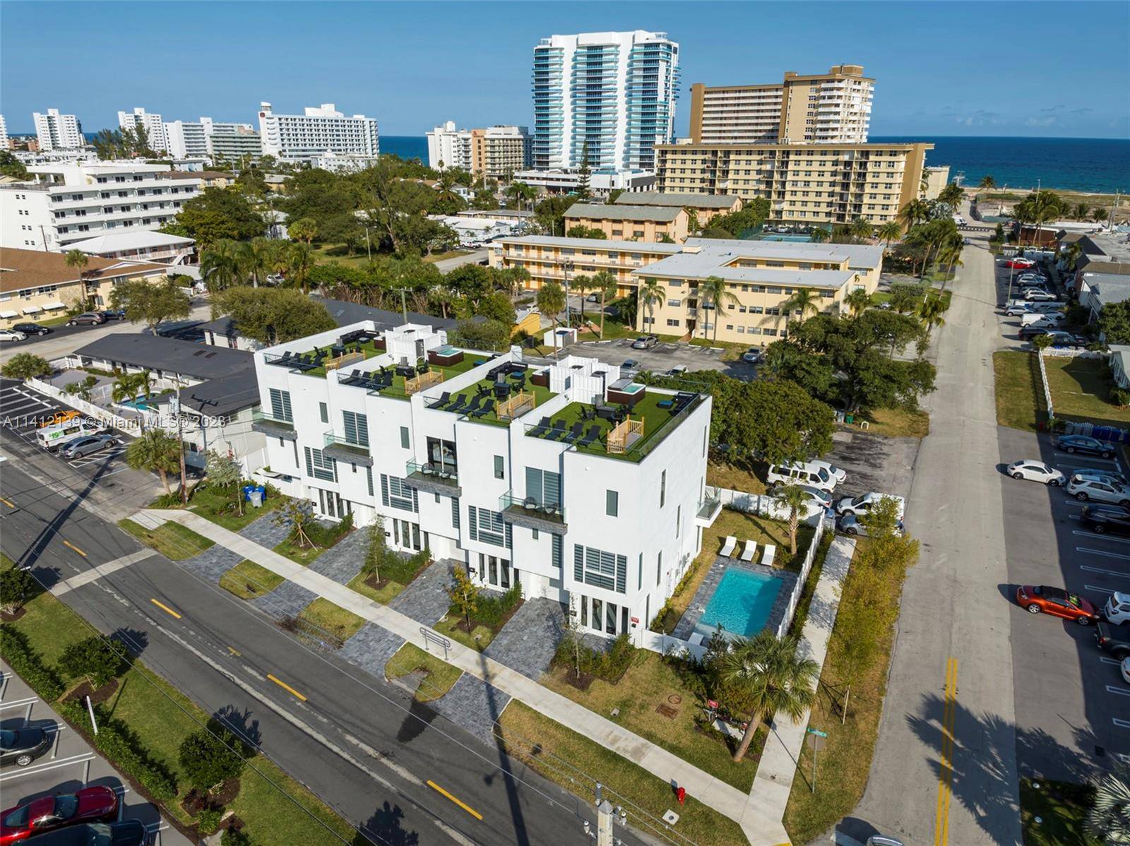 Luxury meets beachside living in this stunning 4 unit townhomes, perfectly situated just one block away from the renowned Pompano Beach.