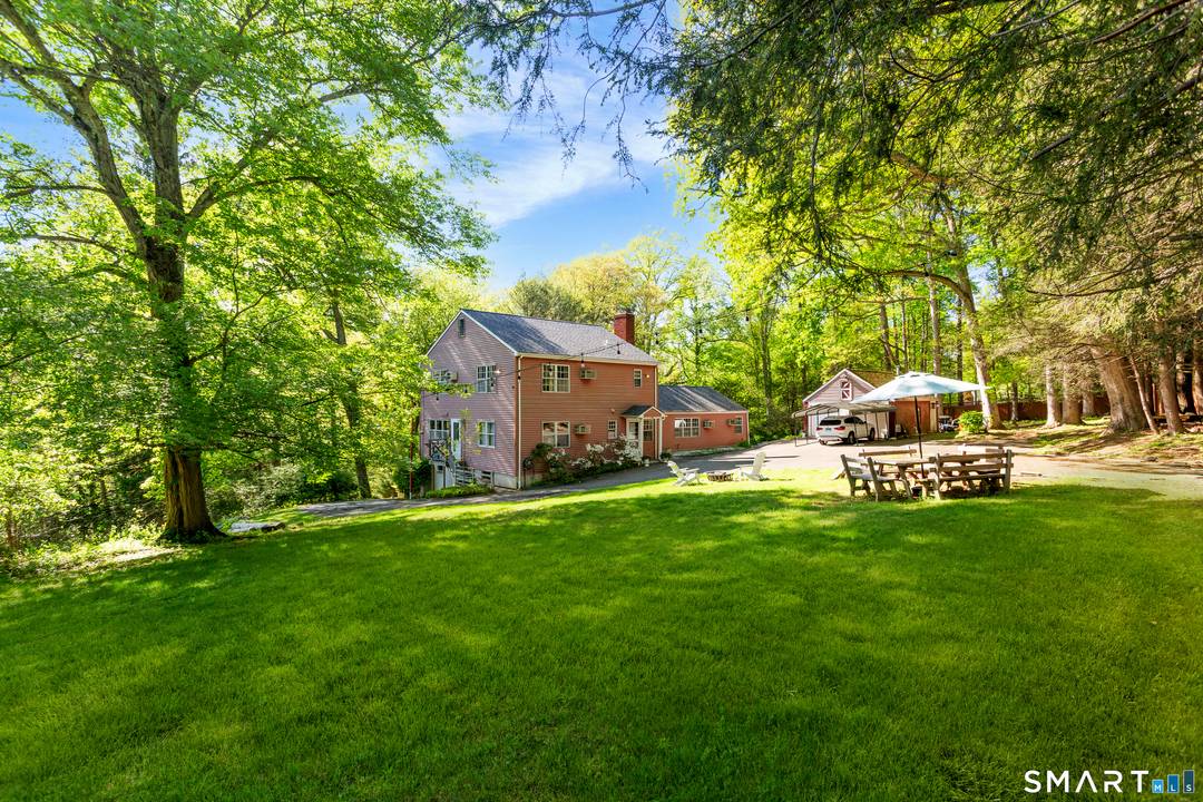 Spacious Colonial set on a serene and private 1.