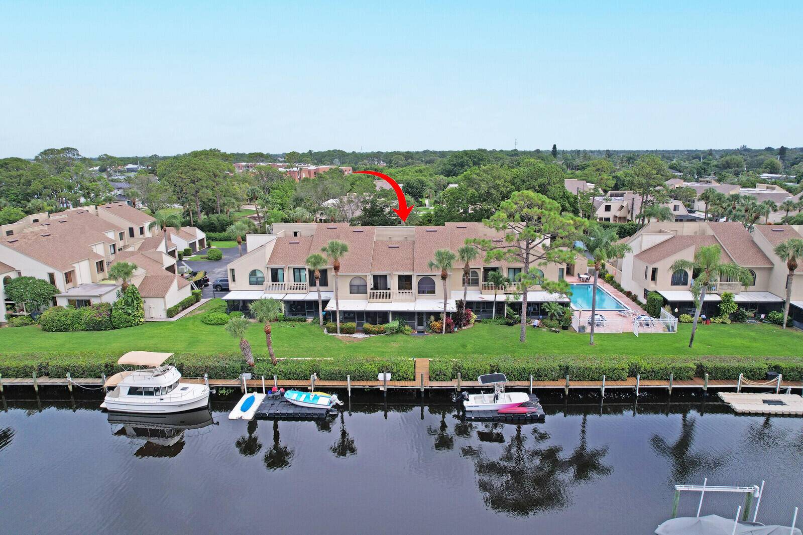 Enjoy wide water views and direct ocean access with no fixed bridges from this well maintained 3 bed, 3 bath townhome in peaceful Tarpon Bay Moorings.