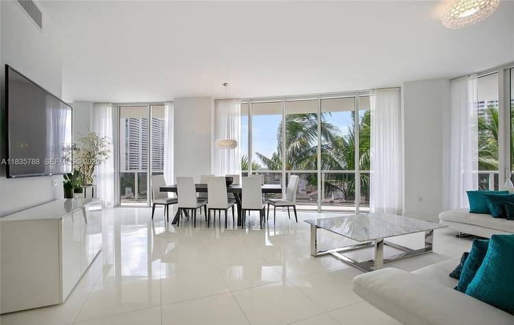 Luxury, high ceiling, amazing, professionally designed, impeccable amp ; bright unit.