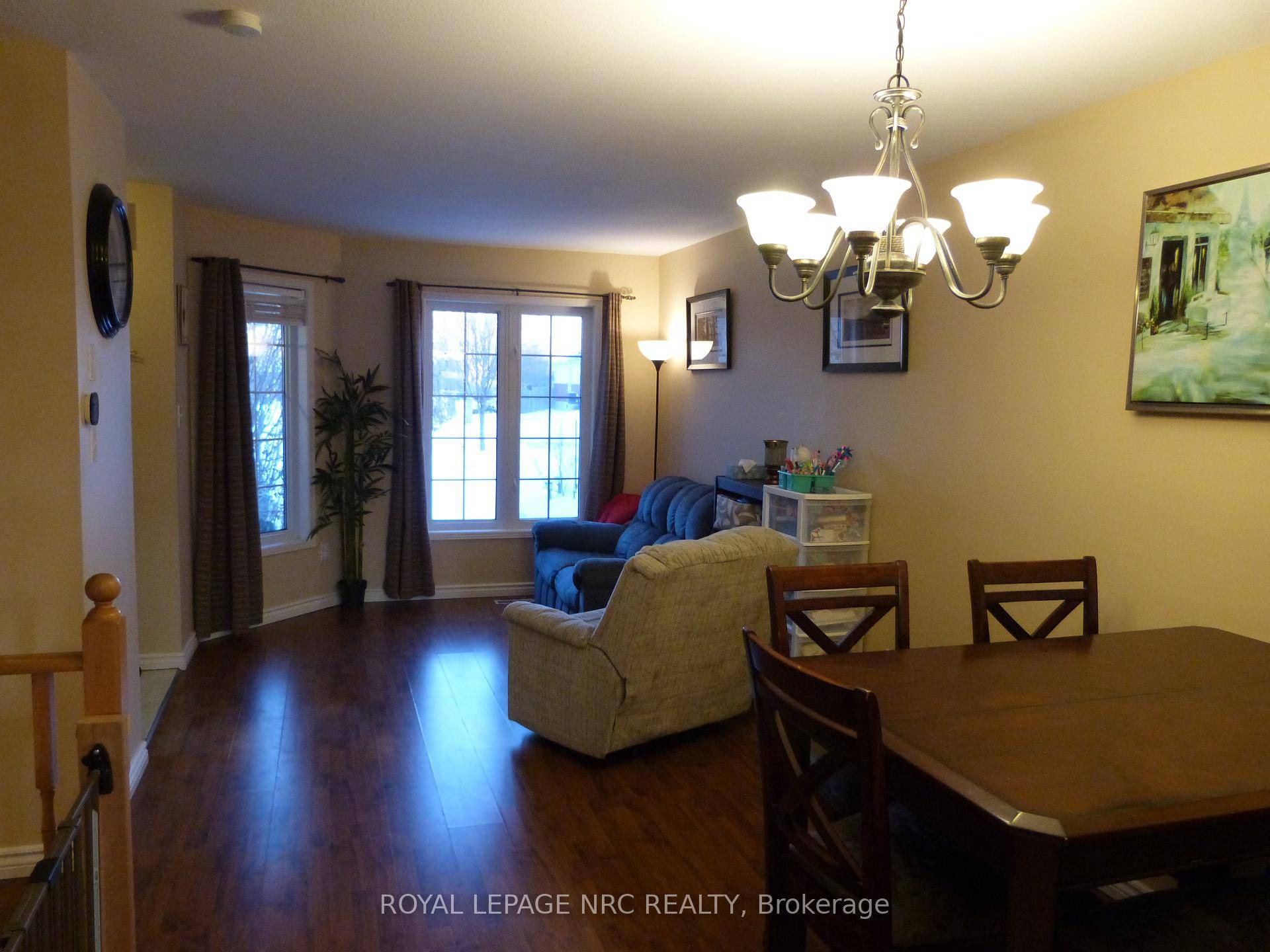 2 1 BEDROOM SIDE SPLIT TOWNHOUSE WITH SINGLE ATTACHED GARAGE BACKING ONTO THE WELLAND STADIUM.