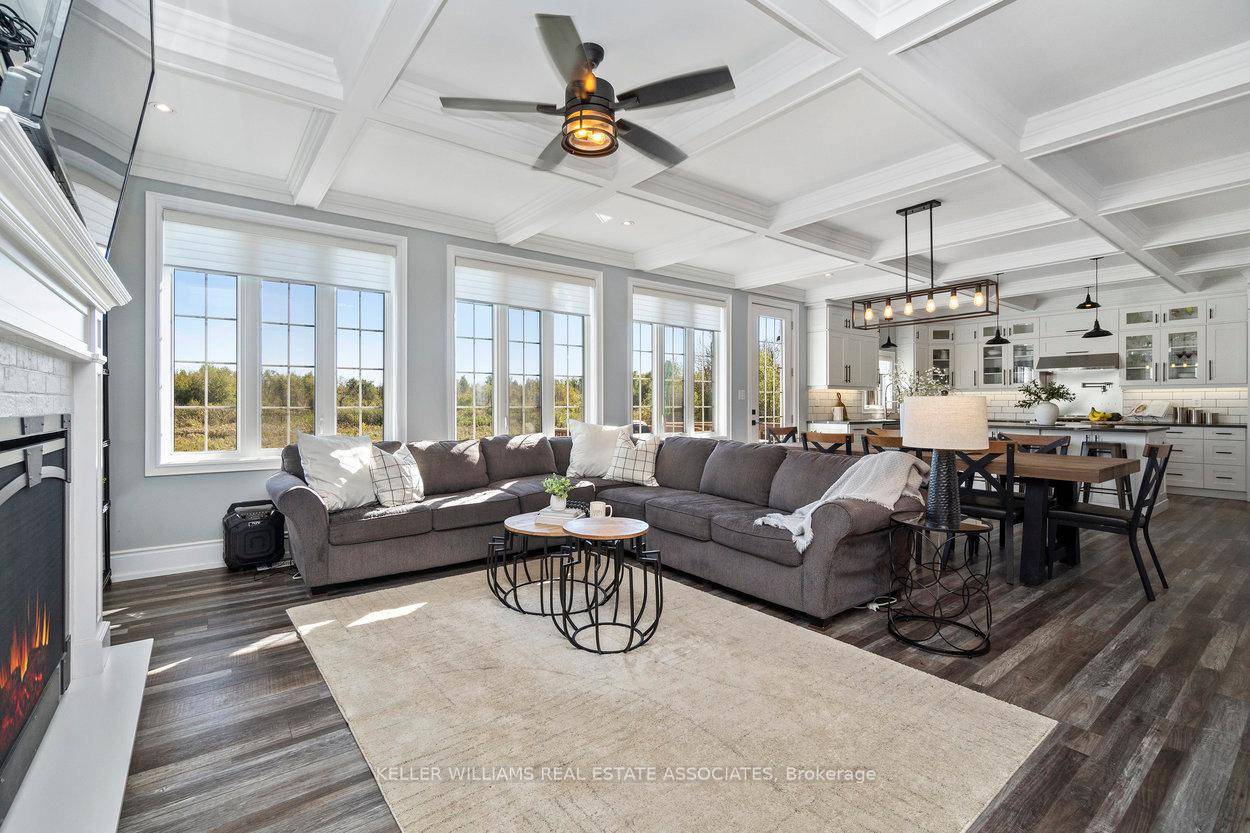 This exceptional 3 year old custom built home is a rare find, nestled on approximately 96 acres of breathtaking land that seamlessly blends privacy, luxury, and convenience.