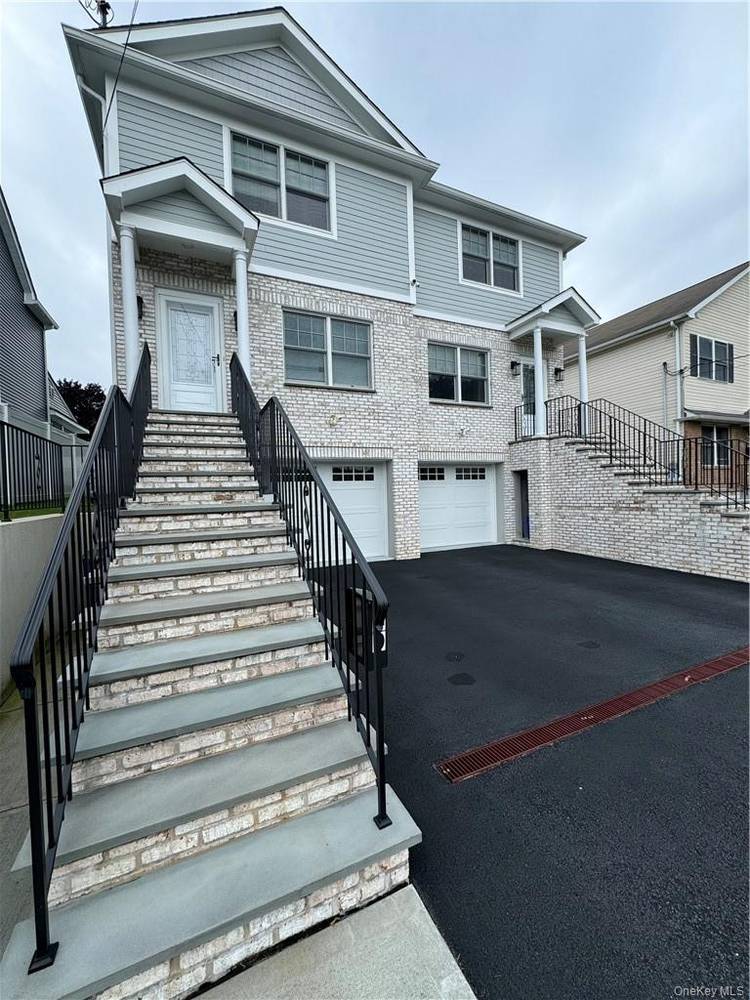 Experience luxury living in the heart of Harrison with this spacious and bright townhome !