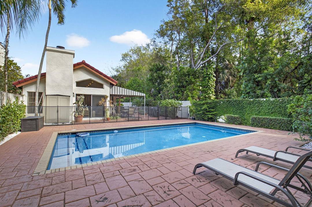 Beautifully updated large corner lot residence offers two bedrooms plus flexible third bedroom office space.