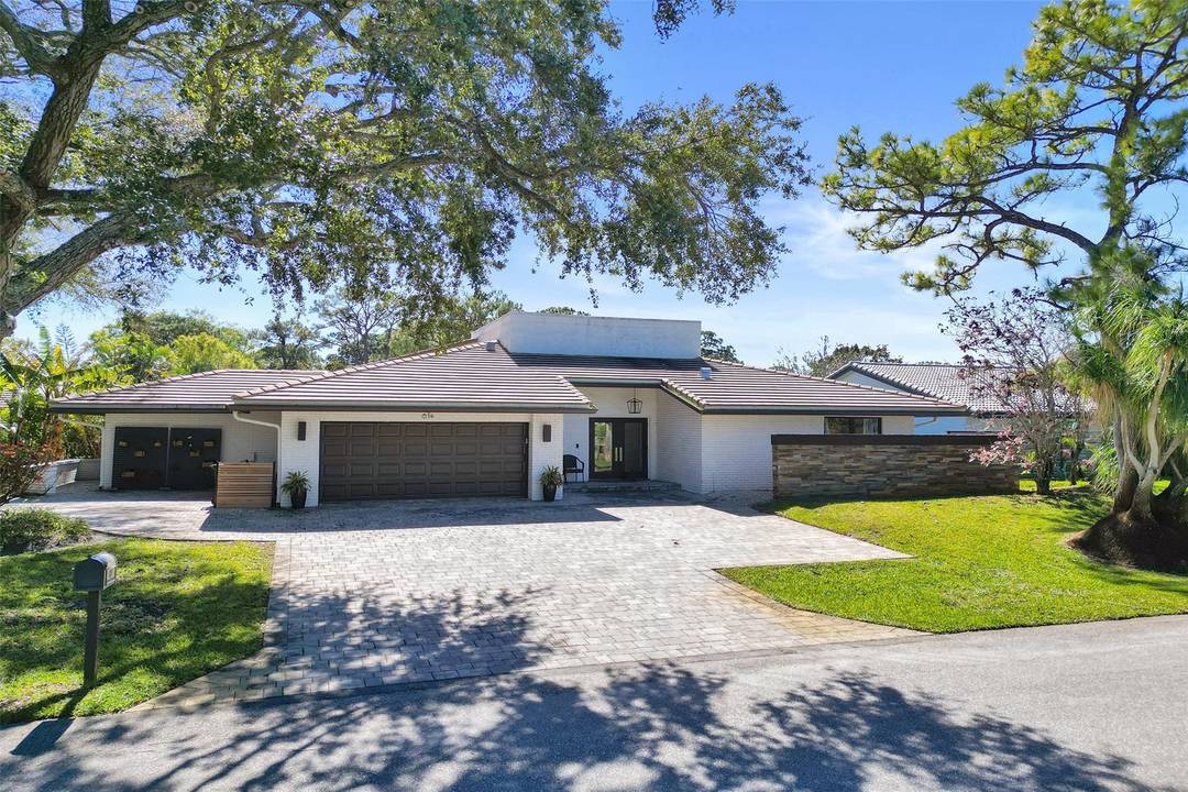 Fully renovated and move in ready this 3 bedroom 3 bath residence is located in Seagate Golf Club.