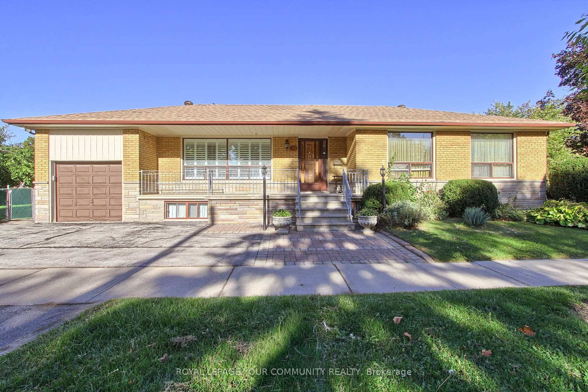 Charming Bungalow with Endless Potential in Coveted Royal York Gardens !
