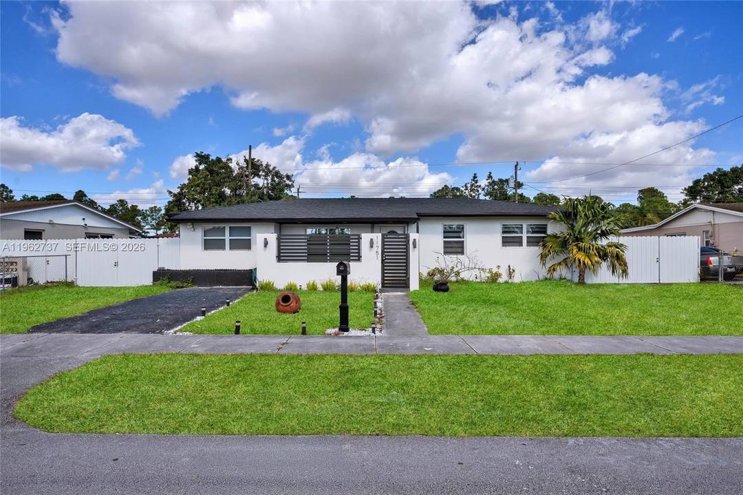 Situated on a fully fenced 7, 500 sq ft lot, this stunning 4 bedroom, 3 bath home offers a spacious open floor plan and extensive modern upgrades throughout.