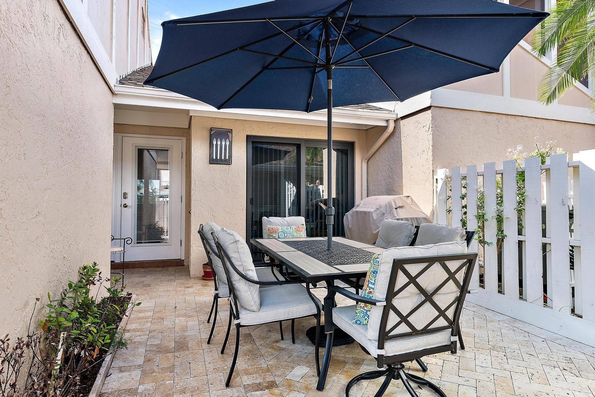 Nestled within the prestigious and sought after Jonathan's Landing community, this rarely available single story townhome presents a unique opportunity to embrace a lifestyle of comfort, tranquility, and refined living.