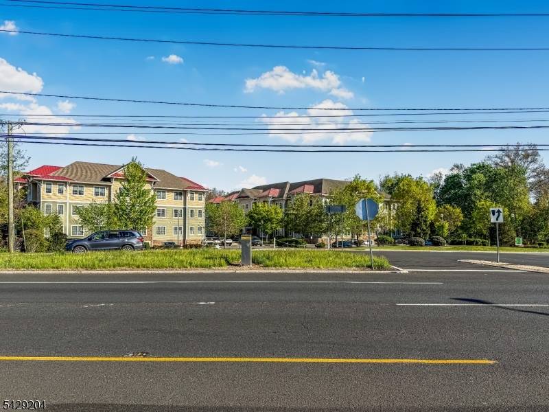 Top floor corner condo offering 1, 811 sq ft of single level living with elevator access.