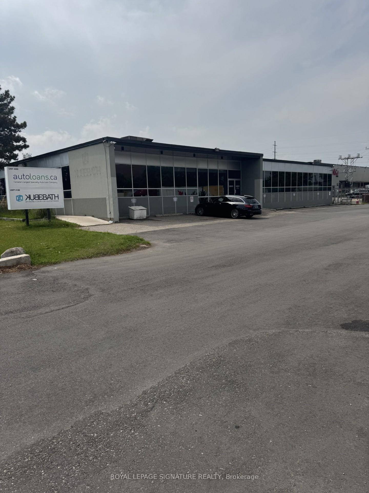 CLEAN WAREHOUSE SPACE WITH UPSCALE OFFICE AREA AND SHOWROOM.