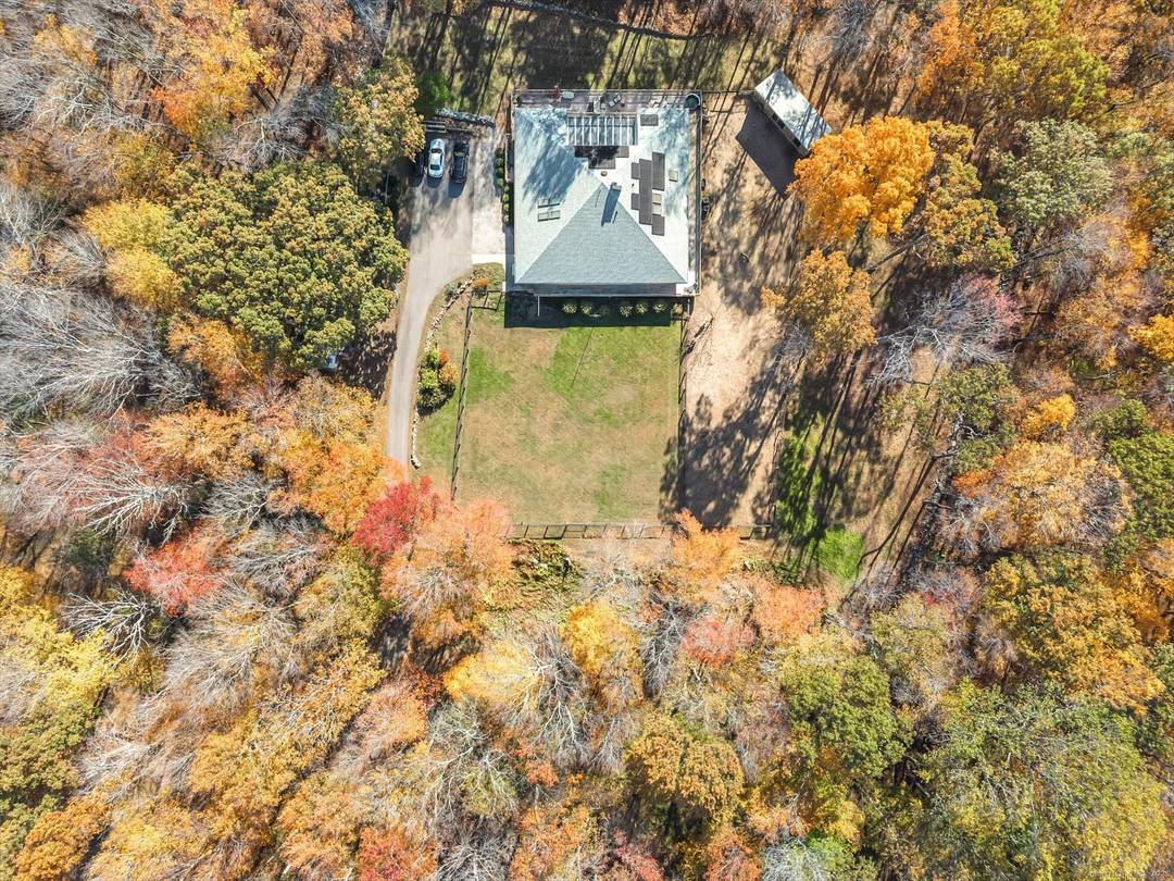 Astonishing, completely private and picturesque estate surrounded by mature forestry, majestic white pines, enchanting old stonewalls adorned with bountiful chartreuse and emerald ferns.