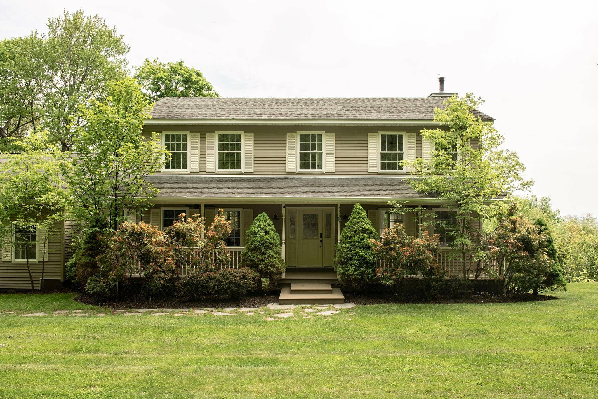 Tucked within the private enclave of Quiet Mountain Estates in Kerhonkson, this turn key retreat sits on 8.