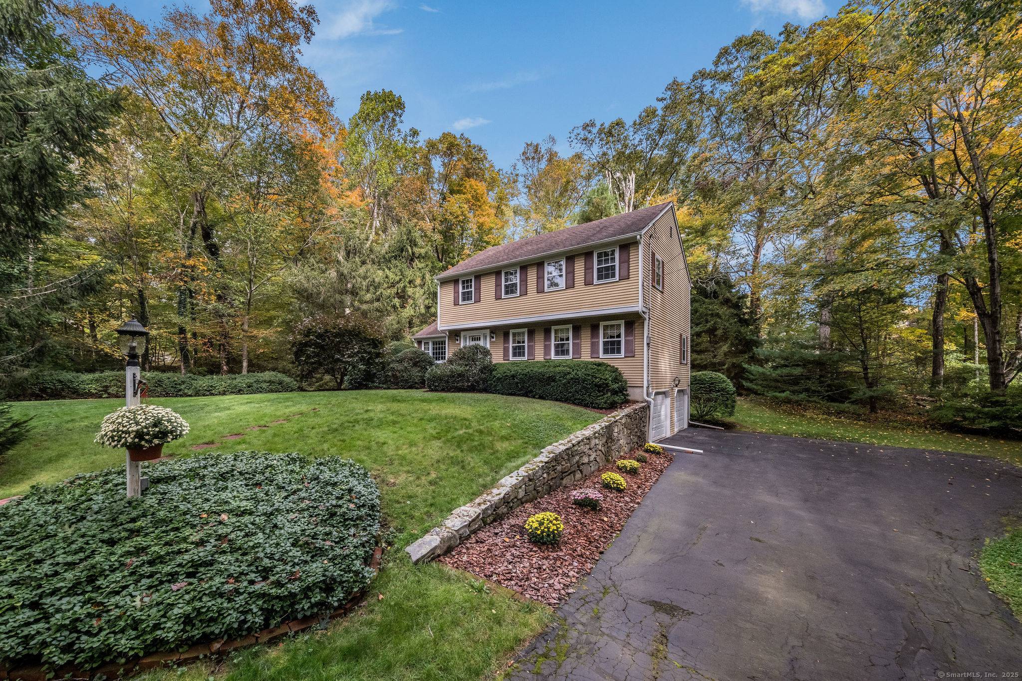 Tucked away on a sought after cul de sac just minutes from downtown Madison, 60 Robin Ridge is a beautifully maintained, custom built home, cherished by the same family for ...