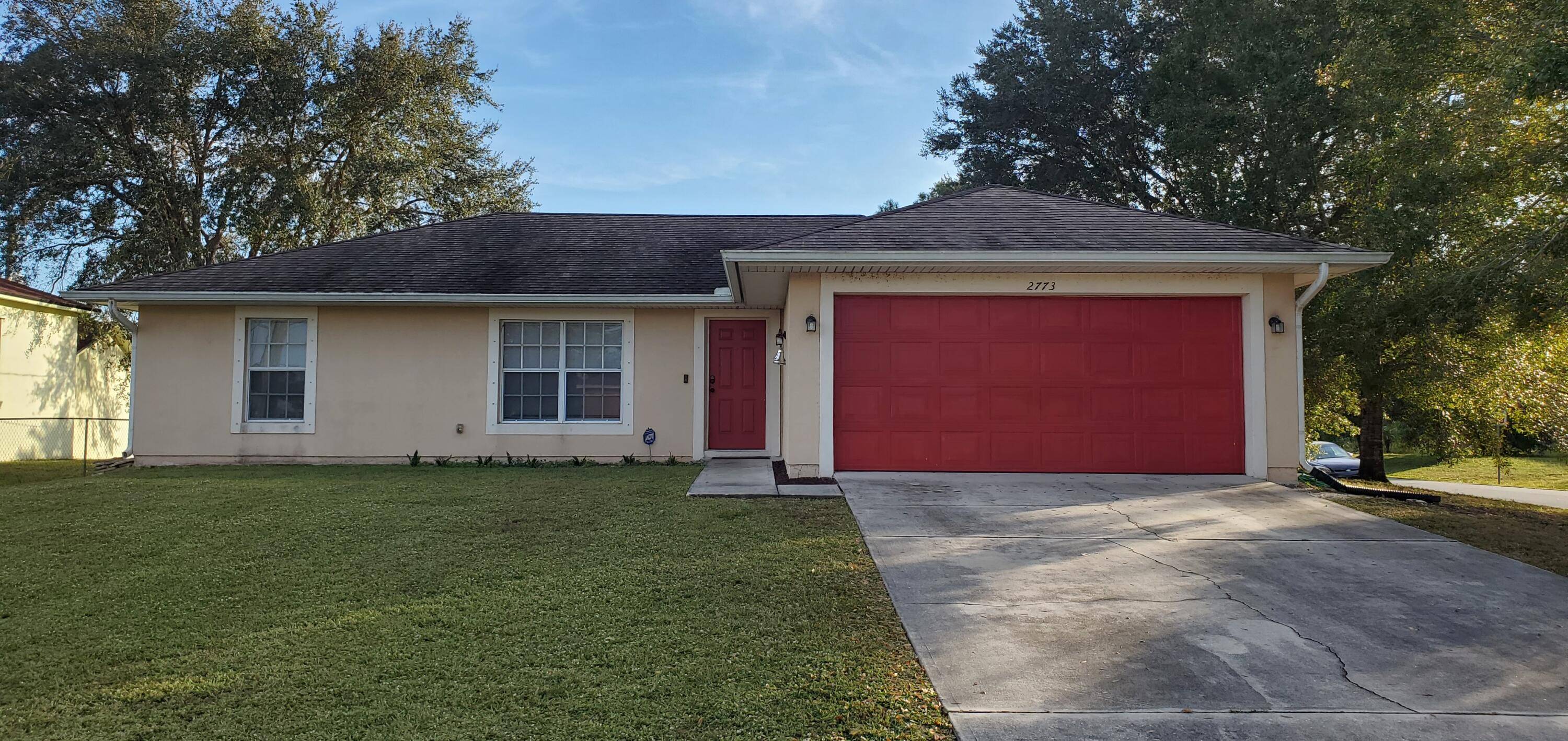 Charming 3 bedroom, 2 bathroom open floor plan home with a 2 car garage on a desirable corner lot.